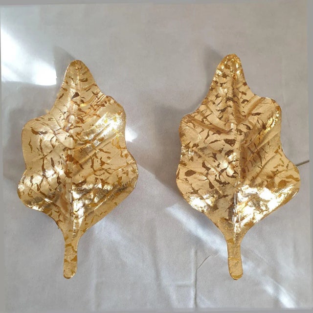 Pair of large Mid-Century Modern gold Murano glass sconces, Mazzega style, Italy 1980s. The large Italian sconces are made...