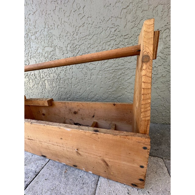 Large vintage handmade solid pine wood toolbox with handle. Rustic aesthetic. Measures 30 1/2” long x 8 3/4” wide x 17”...