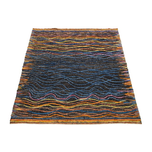 Introducing this stunning handcrafted Moroccan-style wool rug that seamlessly blends contemporary design with traditional...