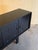 A brutalist/modernist sideboard made out of ebonized oak, 1970s. Attributed to Belgian manufacturer ‘De Coene’. This...