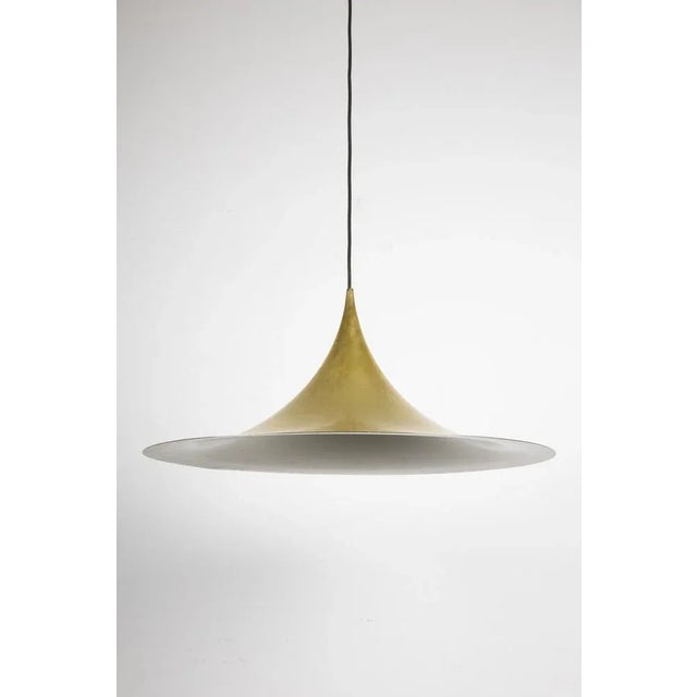 Brass Pendant Light, 1950s, in Flawless conditions. Designed 1950 to 1959 Up to 250V (Europe/UK Standard).The wiring of...