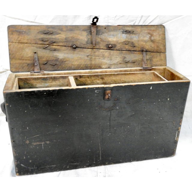 This Primitive tool box makes you wonder what it has held in its past. It has distressed black paint which will fit in...