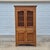 This is a primitive antique tall storage cabinet that was originally intended to be a pie safe or jelly cupboard, circa...