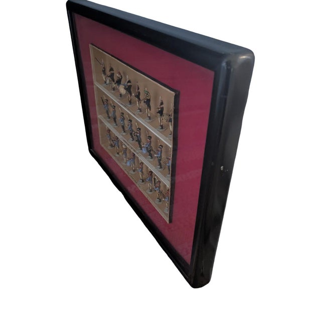 These vintage toy soldiers (24 pieces) depict members of a Chasseurs à Cheval marching band, complete with miniature...