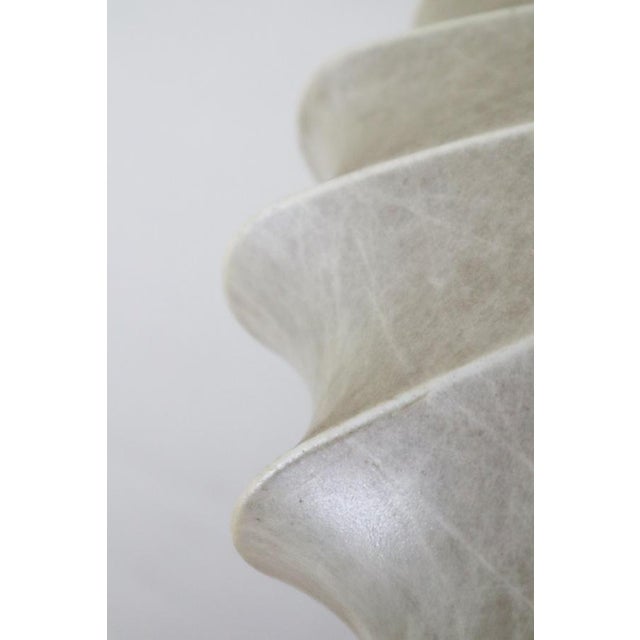 This Cocoon pendant lamp is uniquely beautiful in its elegant and timeless design. The cocoon shade is artfully draped...