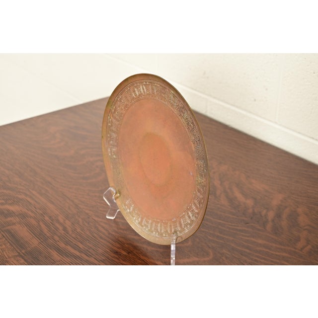 A gorgeous antique Arts & Crafts or Art Deco period bronze plate or charger with decorative border By Tiffany Studios...
