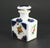 A beautiful vanity bottle Square shaped with longer neck and stopper made of withe porcelain with cobalt blue underglaze...