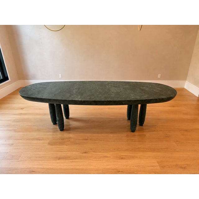 A striking, one-of-a-kind custom dining table fabricated by MGO Stone Classics in New York. Measuring approximately 106...