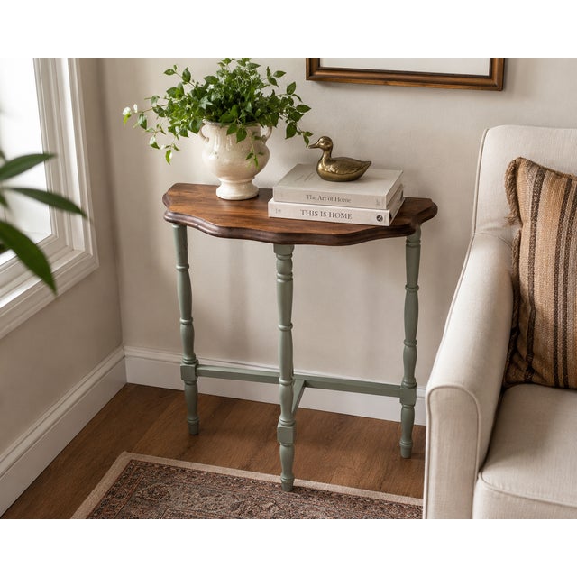 A charming vintage solid wood accent table that has been thoughtfully refinished to blend classic craftsmanship with...