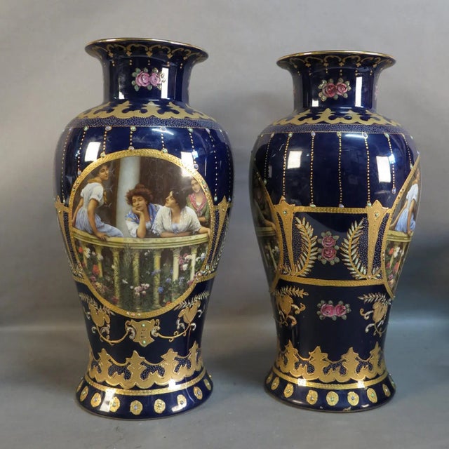 This pair of art nouveau vases were manufactured in France by Royal Limoges between 1900 and 1920. They feature paintings...