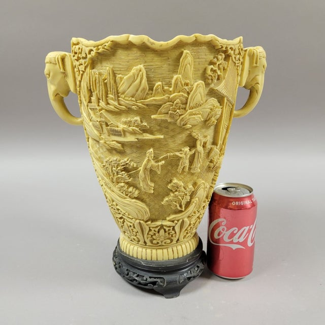 A dramatic vintage Italian chinoiserie vase dating to the 1960s–1970s, richly decorated with deeply carved courtyard and...