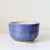 Hand-thrown studio pottery bowl by ceramic artist Howard Fields. This rounded footed bowl features a rich cobalt-to-...