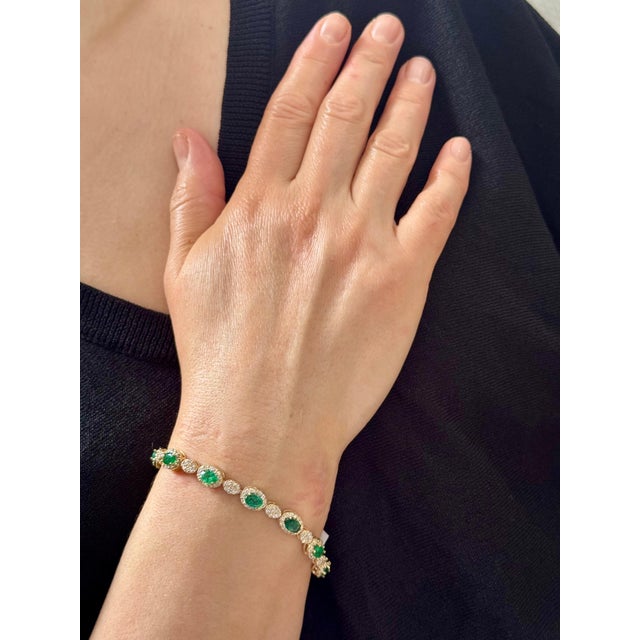 Approximately 8 Carat Natural Brazilian Emerald & Diamond Tennis Bracelet 14 Karat Gold This exceptionally affordable...