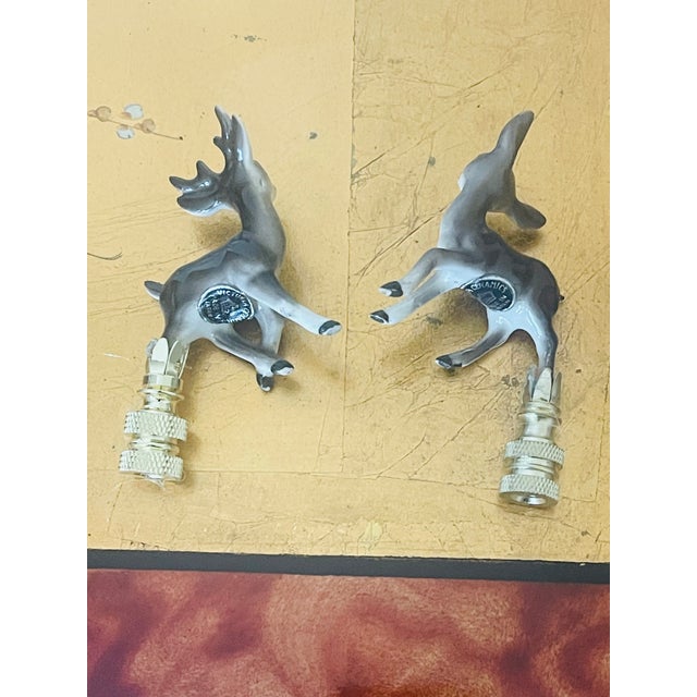 Japanese ceramic super cute couple of Bambi deers on brass bases as lamp finials.