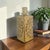 A Japanese Mid-Century Modern stoneware bud vase attributed to Otagiri Mercantile Company, or OMC, with a tall square-...