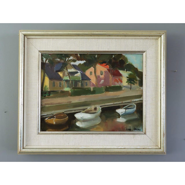 HOUSES BY THE CANAL Size: 16.5 x 19.7 inches (including frame) Oil on board A charming mid-century painting that captures...