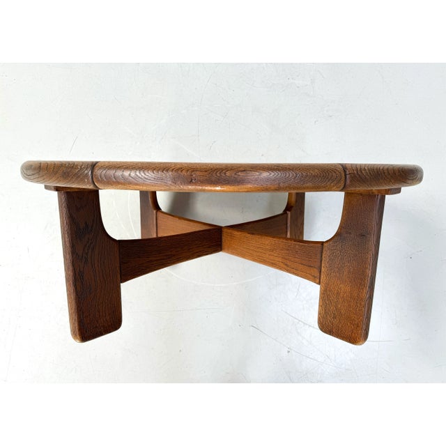 This is a solid oak coffeetable in very good condition.It has no damages , great patina. Made in the seventies in the...