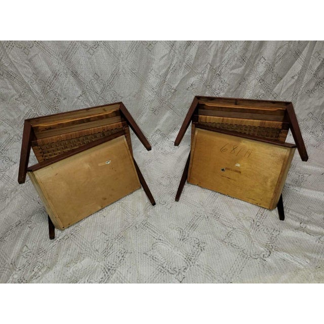 This pair of Danish Rosewood side tables with rattan shelf and drawer was made in the 1960s by in Danish Designer Severin...