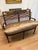 Elegant vintage mahogany settee featuring an exceptionally handsome open diamond-lattice back, carved decorative crest...