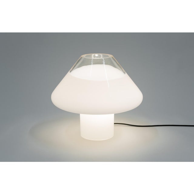 The lamp was produced in the 1980s by the Venice-based lamp manufacturer Leucos. This piece is attributed to the mentioned...
