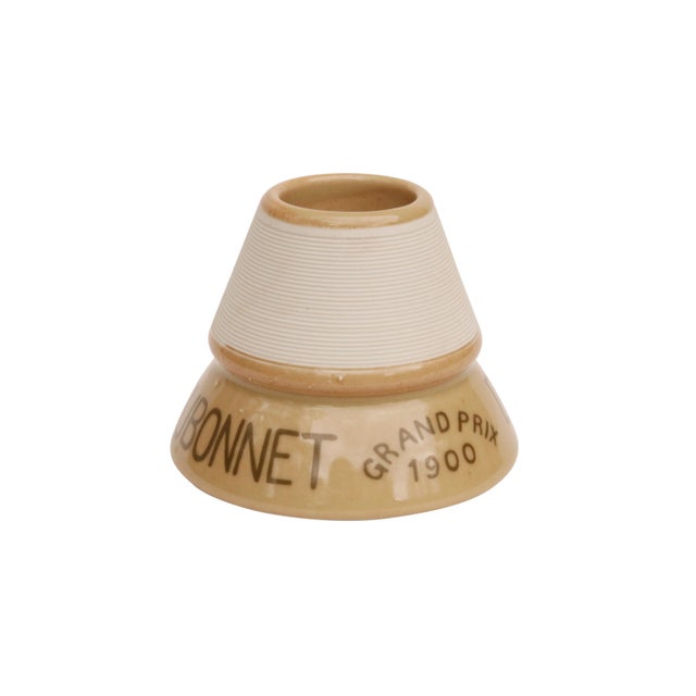 A pair of Parisian café ceramic match strikers. Made to advertise Dubonnet and the Grand Prix of 1900. Dimensions per...