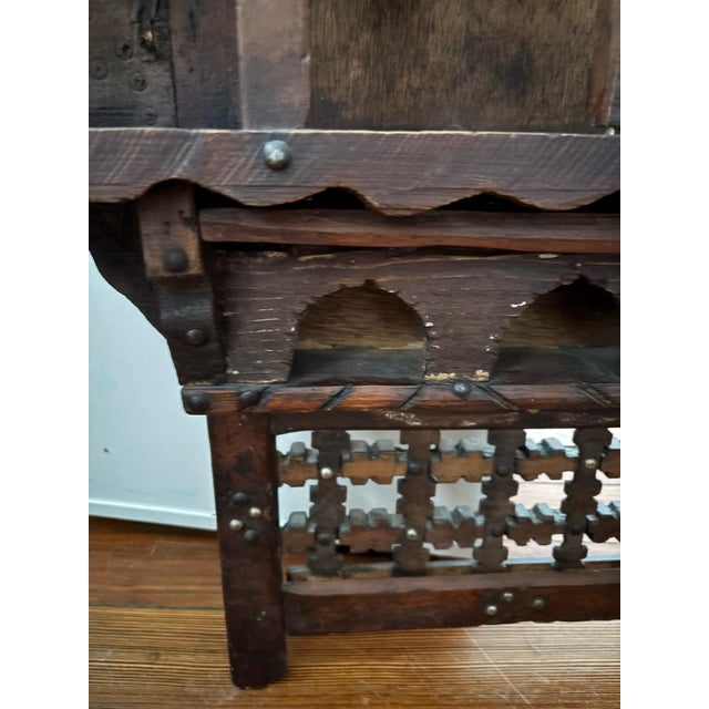 Elevate your space with this impressive, large-scale vintage Moroccan wall shelf. This hand-carved piece is a masterclass...