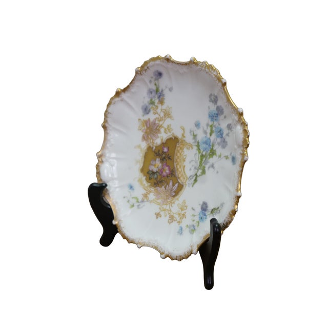 This exquisite antique Limoges porcelain cabinet plate showcases the romantic elegance of late 19th-century French...