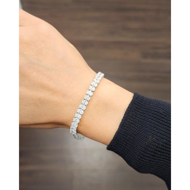 This exquisite tennis bracelet showcases modern elegance, meticulously designed to emphasize its stunning features. Set...