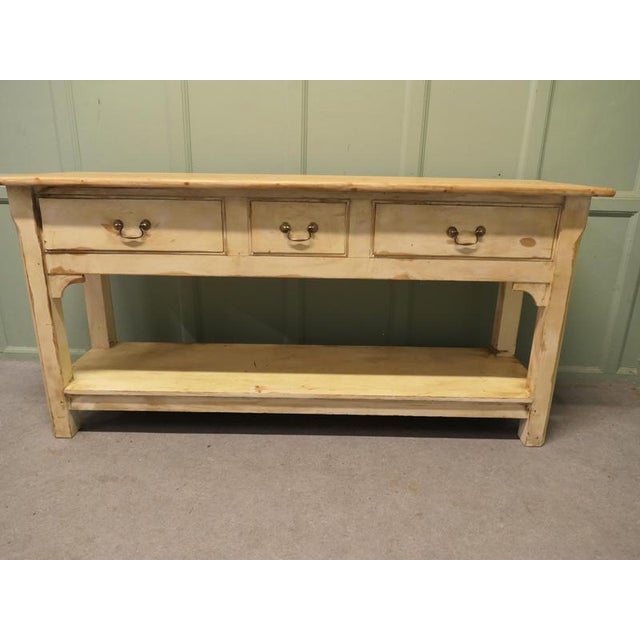 20th Century Rustic Painted Pine Pot Board Dresser The dresser base has a solid pine top, it stands on square legs, there...