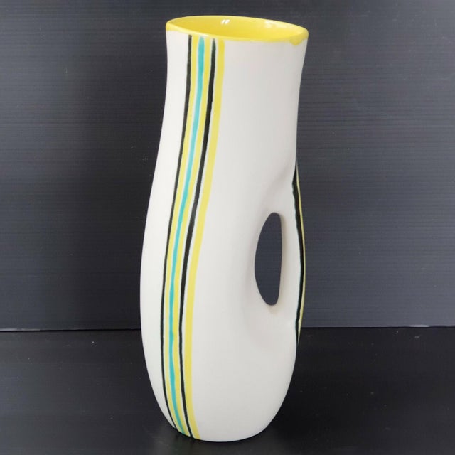 Very good overall condition except for a small chip on the rim of one glass and some wear to the rims of the other...