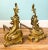 Exquisite pair of andirons with brass Rococo style filigree and cast iron bracket supports. Made in France in the late...