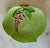 Vintage hand painted plate featuring the "Green Foxglove" pattern by the celebrated English pottery manufacturer Carlton...