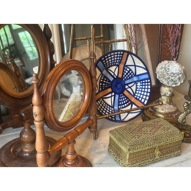 This is a striking piece of mid-century modern studio pottery, a decorative dish or plate featuring a bold abstract...