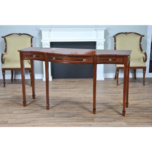 As beautiful as it is long the Niagara Furniture Three Drawer Mahogany Sideboard is an eye catching piece with a large and...