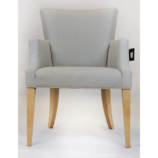 Le Jeune Upholstery Kilani Dining Armchair Showroom Model Offered for sale is the KILANI DC4.923 showroom model dining...