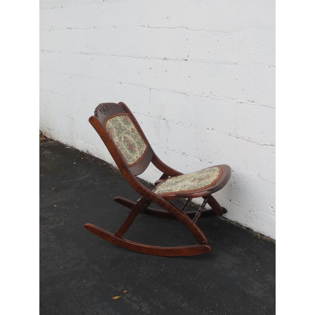 This Rocking Chair is made of wood, solid wood, upholstery. This beautiful rocking chair has fabulous Early 1900's...