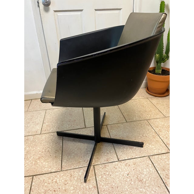 Strip Chair from Carlo Colombo for Poliform. Stylish office or lounge black scoop swivel chair, with shimmery gold green...