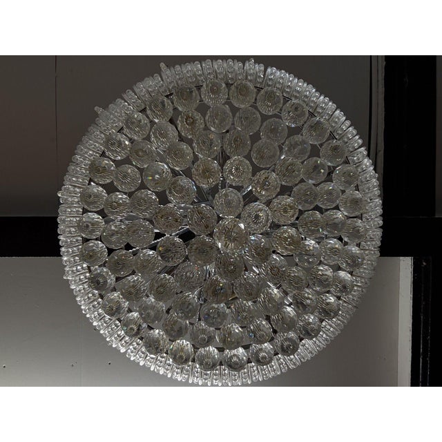This striking crystal basket chandelier brings elegance and sparkle to any interior. Designed with a polished chrome...
