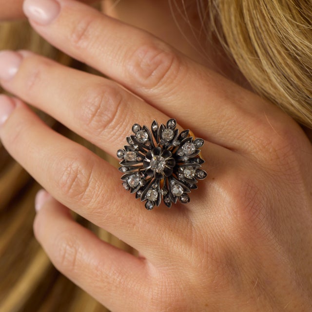 Victorian 2.60 carat diamond 18k yellow gold silver flower ring captures the romance and artistry of the late 19th century...