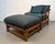 This vintage lounge chair with matching ottoman features a warm bamboo frame and deep, plush cushions upholstered in a...