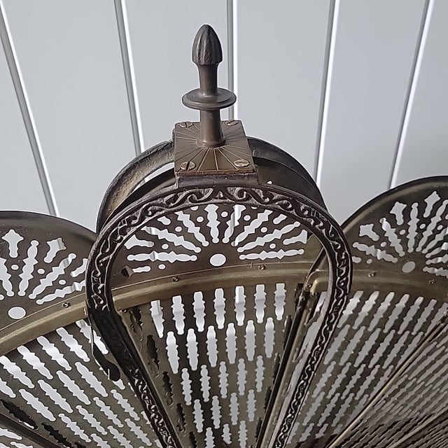 This Antique Fabulous Art Deco Double Griffin Brass Peacock Fan Fireplace Screen from the 1920s is a stunning piece of...