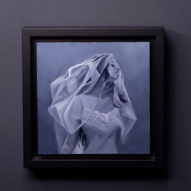 This oil painting on panel presents a figure draped in delicate layers of fabric, evoking a sense of ethereal beauty and...