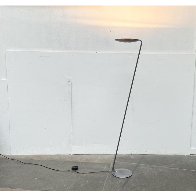 The standing lamp from the Zeta series from the Italian lighting manufacturer Lumina according to a design by Giuseppe...