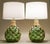 A brilliant and striking pair of large robust round bottle form "Macrame" net globes of bottle Green thick molded glass...
