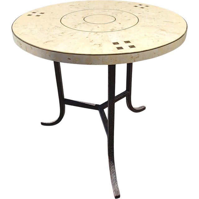 Postmodern Casa Bique side table featuring a tessellated fossil stone top with geometric brass inlay. The circular top is...