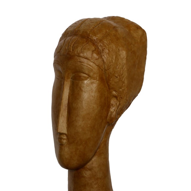 Tete de Femme Modigliani, Amedeo Year: 1961 Cast Resin Sculpture Size: 22 x 6.5 x 5.5 in. (55.88 x 16.51 x 13.97 cm)