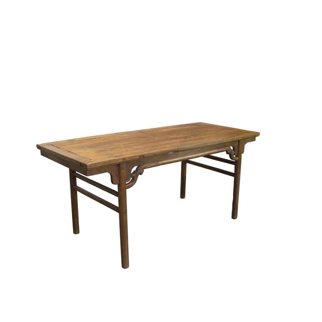 This early 18th century elegant painting table, or pingtou'an, is crafted from solid elm wood, assembled using traditional...