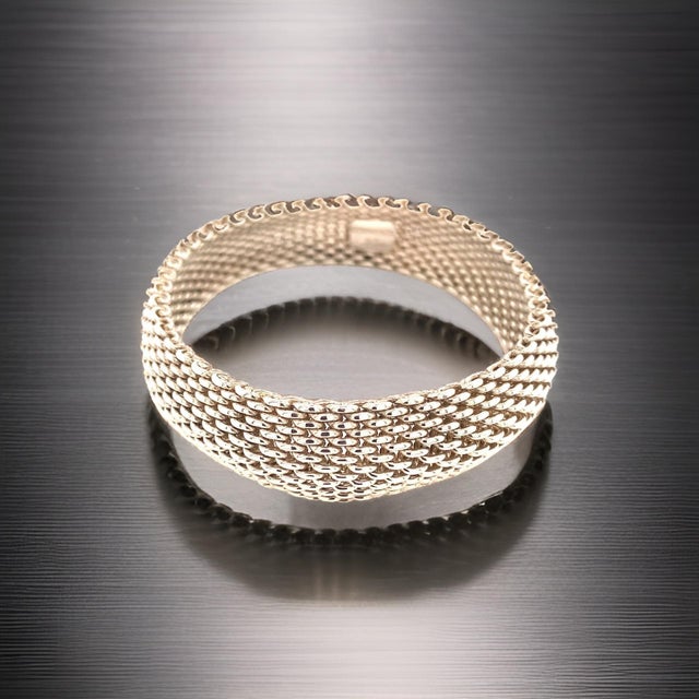 AuthenticTiffany & Co Somerset Bangle M 7.5" Sterling Silver 17 mm Estate TIF941 This elegant Authentic Tiffany bracelet...