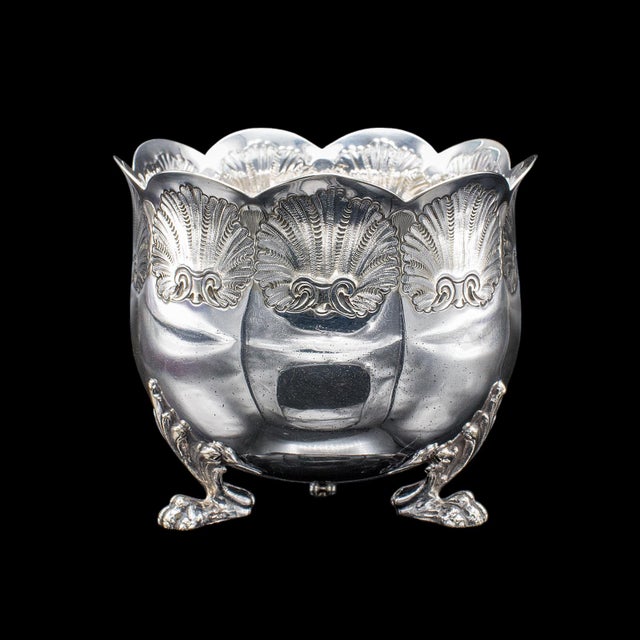 This is an antique sugar bowl. An English, silver plated decorative table dish, dating to the late Victorian period, circa...