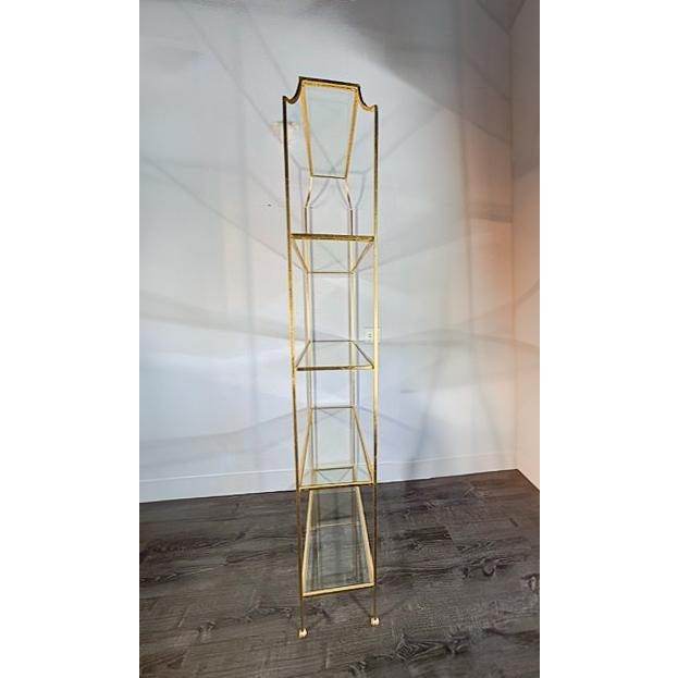 This gorgeous gilded etagere by Worlds Away has 4 glass shelves perfect for displaying a collection of objects. It...